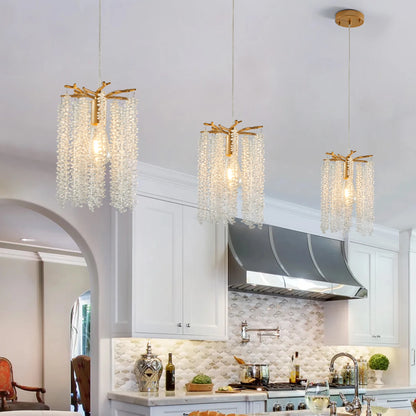 Luxury 3-Pack Crystal Pendant Lights, Elegant Golden Finish Chandelier with Waterfall Bead Design.